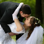 Wedding Limo Perth couple with the bride and groom celebrating their wedding day in Fremantle. Showtime Limousines provided the limousine / wedding car service for them and their bridal party. Perth, Fremantle, and ocean beach photo locations